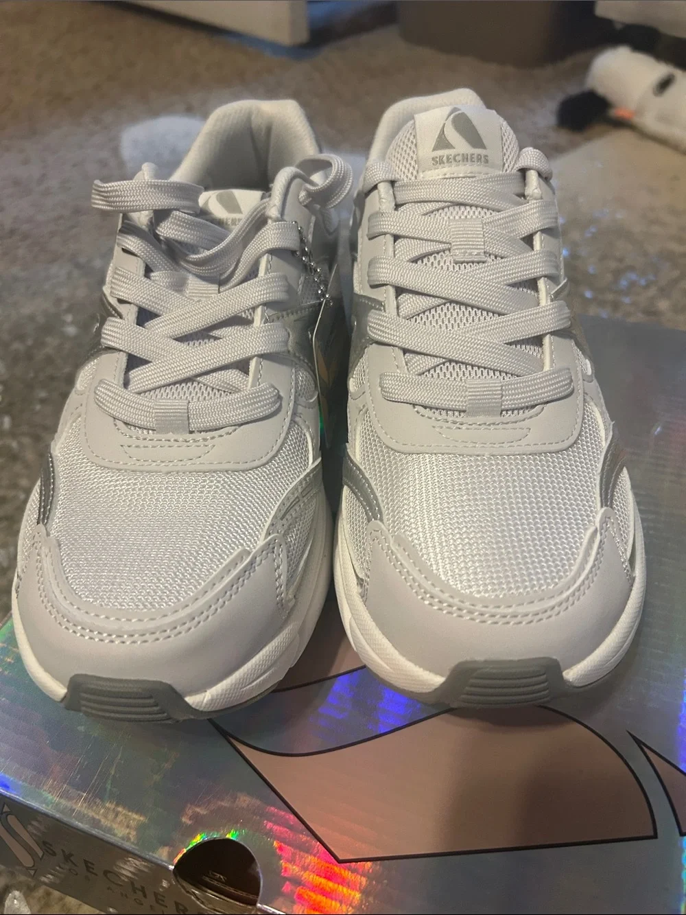 Skechers Women's White Sneakers with Silver Metallic Accents